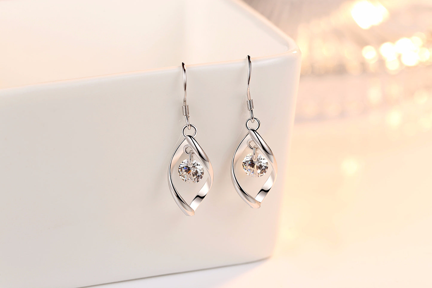 Elegant Twist Drop Earrings with Dangling Crystal